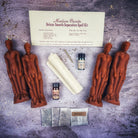 Deluxe Smooth Separation Candle Spell Kit for Male/Male by Parlour of Wonders, featuring black candles and love separation symbols.