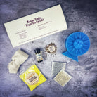 Bright Sun Candle Spell Kit by Parlour of Wonders featuring black candles for success, fame, and radiant energy.