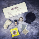 Bright Sun Candle Spell Kit by Parlour of Wonders featuring black candles for success, fame, and radiant energy spells.
