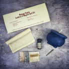 Black Cauldron of Magick Candle Spell Kit by Parlour of Wonders for transformation and positive change, featuring candles and spell components.