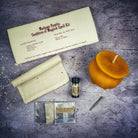 Black Cauldron of Magick Candle Spell Kit by Parlour of Wonders for transformation and positive change, includes candles and ritual tools.