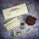 Black Cauldron of Magick Candle Spell Kit from Parlour of Wonders, featuring candles and tools for transformation and positive change.