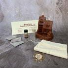 Happy House Candle Spell Kit by Parlour of Wonders featuring black candles and herbs for home protection, harmony, and blessings.