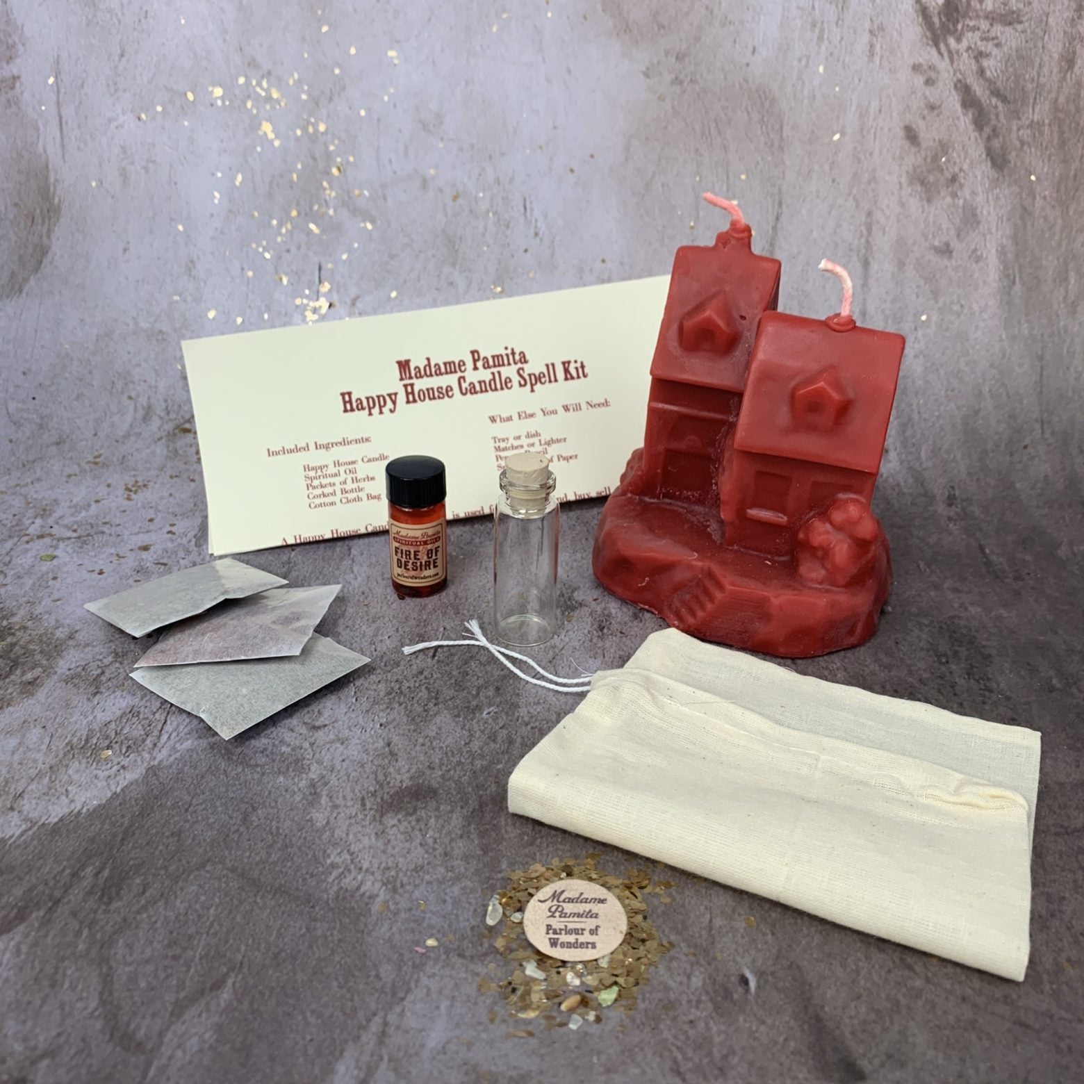 Parlour of Wonders Happy House Candle Spell Kit with black candles, herbs, and tools for home protection and harmony.