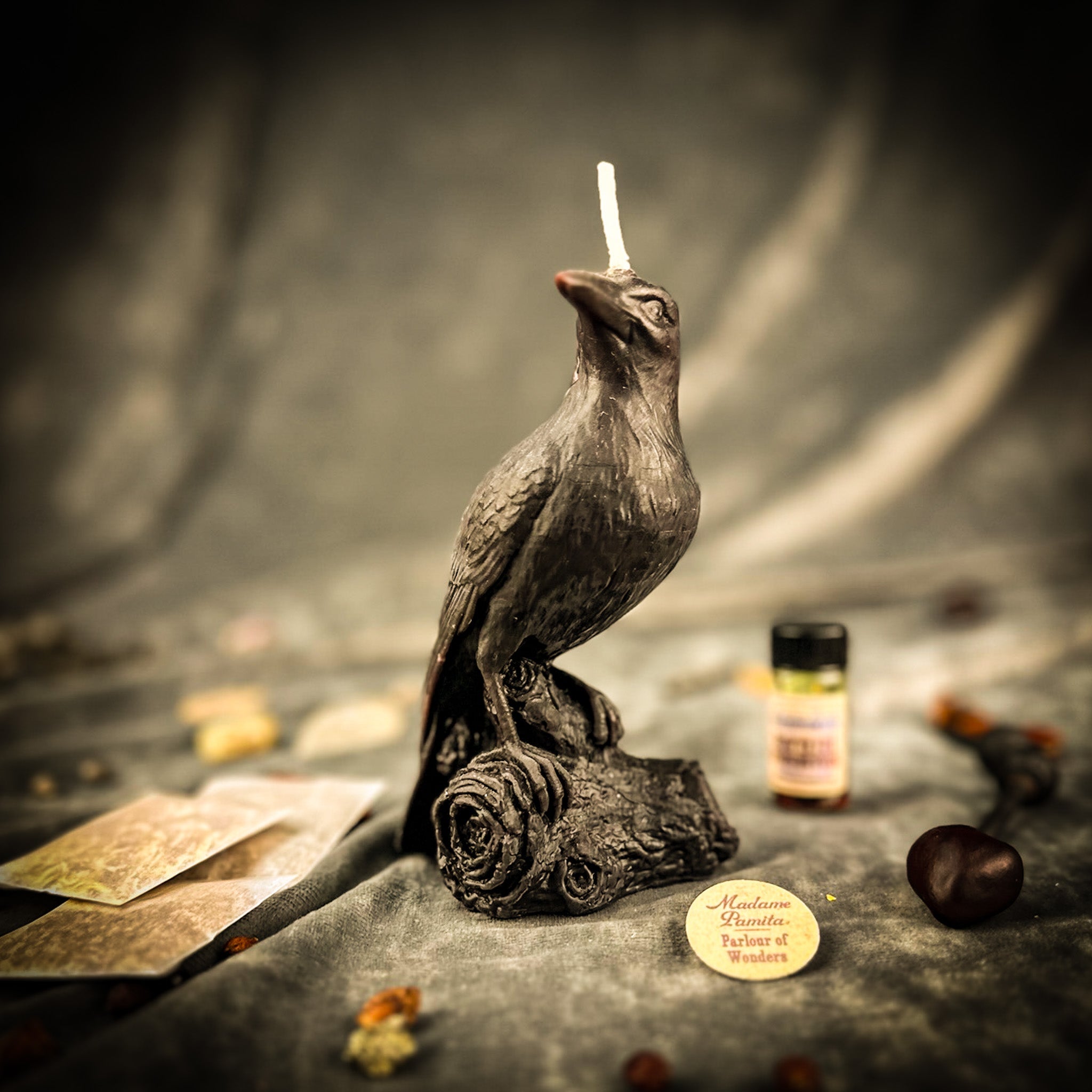 Parlour of Wonders Raven Magic Candle Spell Kit with black candles for intelligence and spirit world connection.