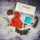 Black Unicorn Magic Candle Spell Kit for manifestation and wishes by Parlour of Wonders, includes candles and spell components for magic rituals.