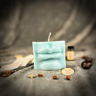 Blue Ex-Voto Mouth Candle Spell Kit by Parlour of Wonders for communication and healing magic, featuring candles and ritual tools.