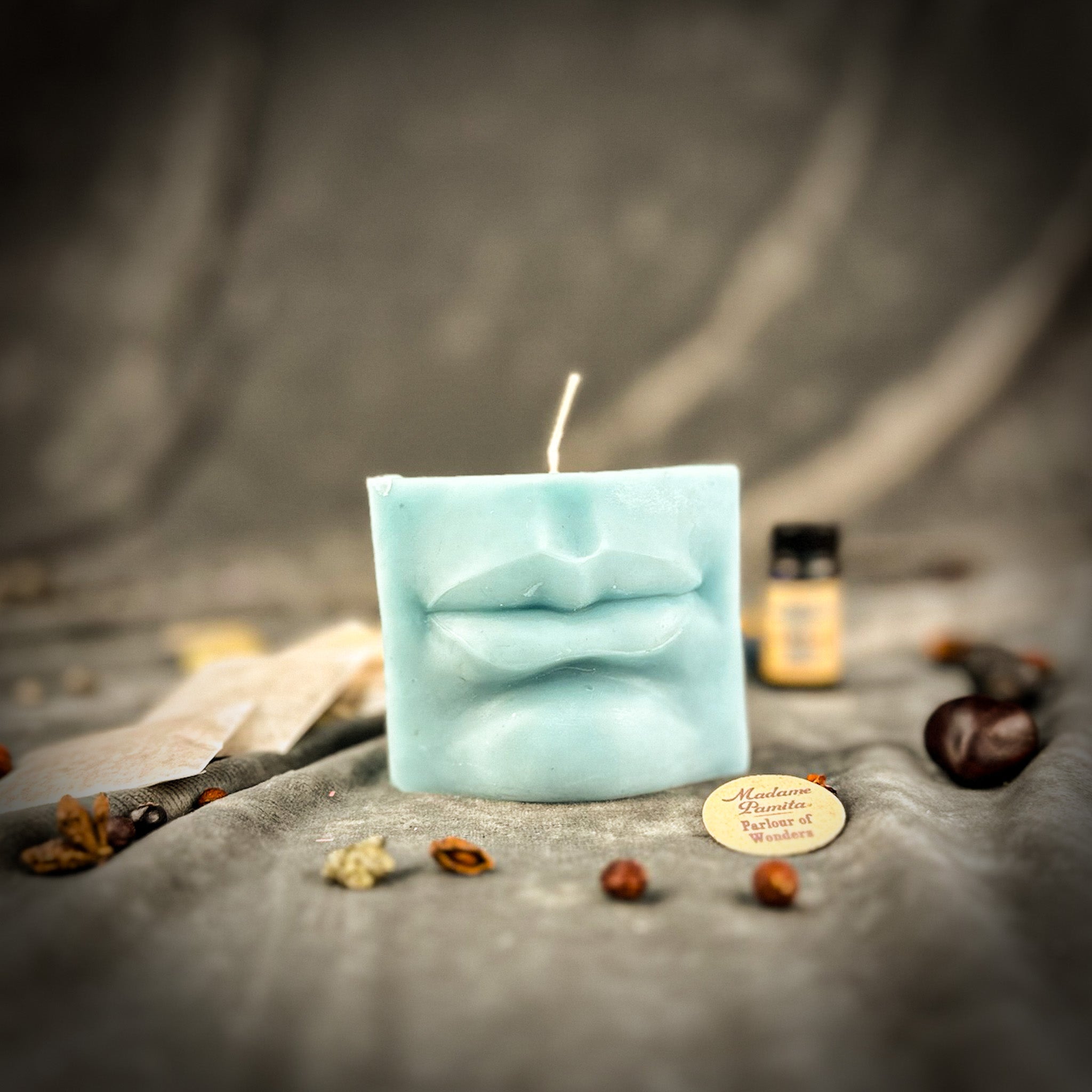 Blue Ex-Voto Mouth Candle Spell Kit by Parlour of Wonders for communication and healing magic, featuring candles and ritual tools.