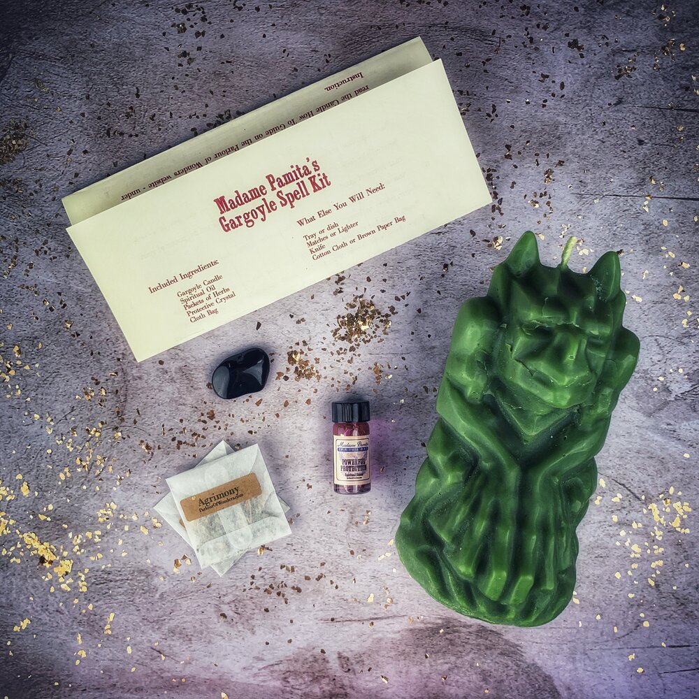 Parlour of Wonders Gargoyle Protection Candle Spell Kit with brown candles and guardian symbols for powerful magic protection.