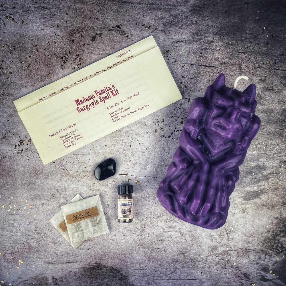 Parlour of Wonders Gargoyle Protection Candle Spell Kit with brown candles and magical symbols for guardian protection and legal matters.