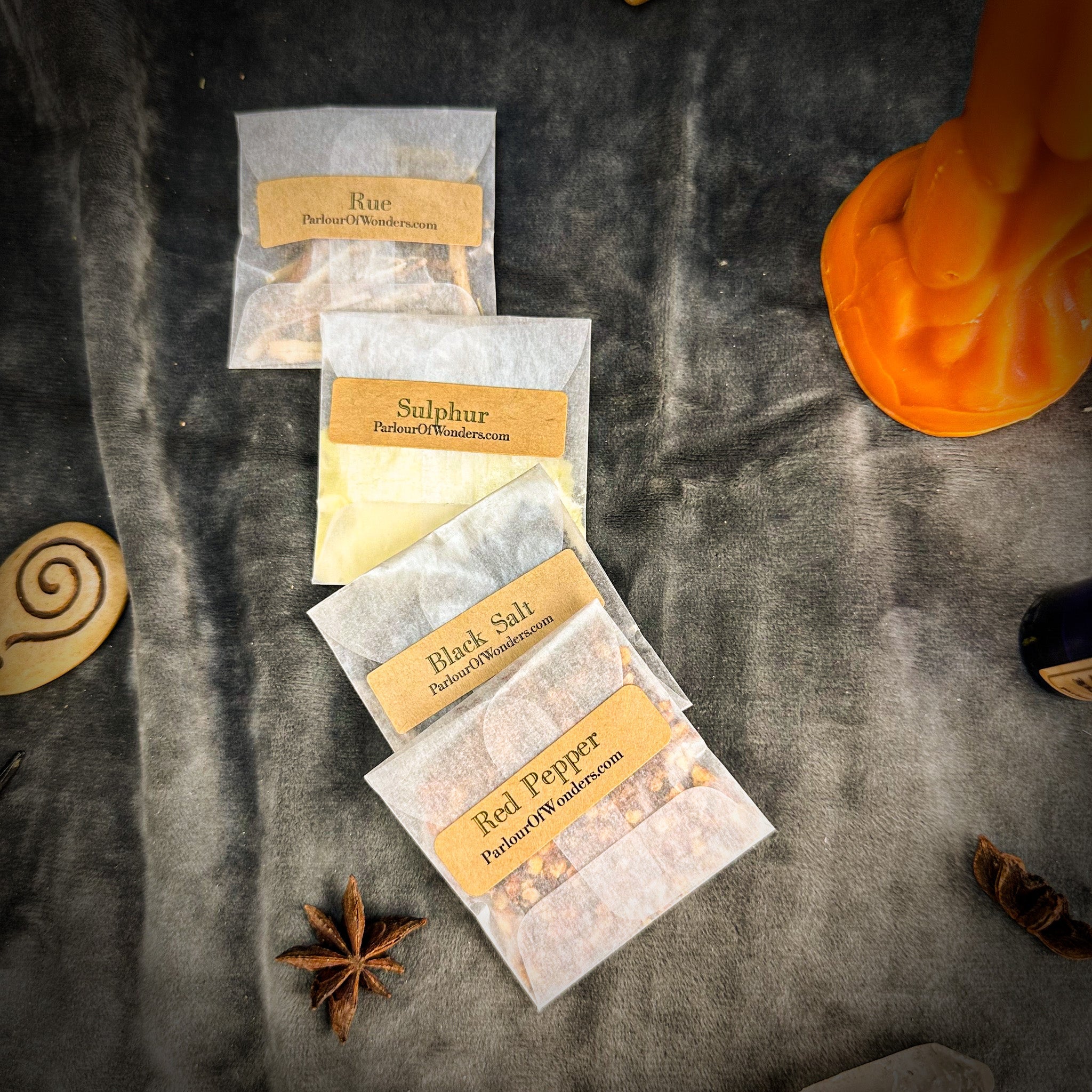 Parlour of Wonders Hex the Patriarchy Candle Spell Kit featuring candles, herbs, and tools for empowerment and justice rituals.