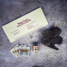 Green Candle Spell Kit with clover symbols from Parlour of Wonders for good fortune and luck spells.