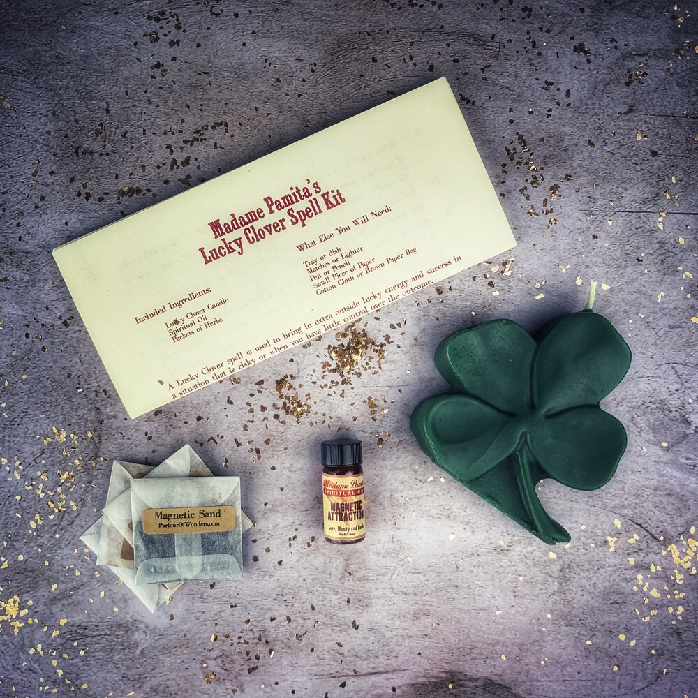 Green Candle Spell Kit with lucky clover symbols for good fortune and luck, by Parlour of Wonders.