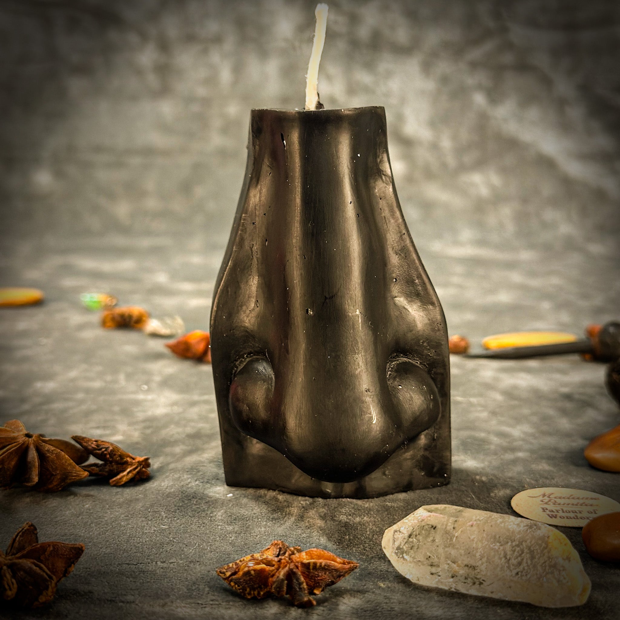 Green Ex-Voto Nose Candle Spell Kit by Parlour of Wonders for clairalience and intuitive scent magic, includes candle and spell tools.