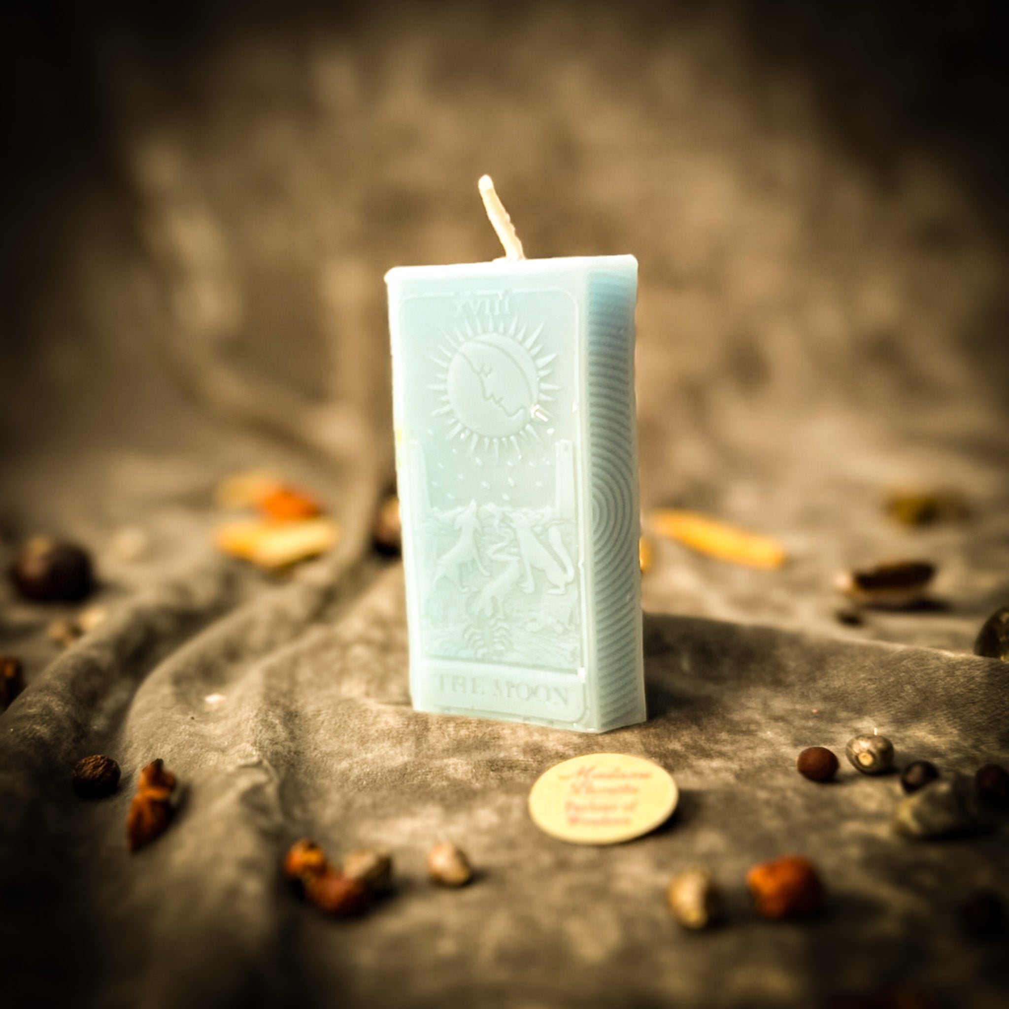 Green candle spell kit from Parlour of Wonders with mystical symbols for intuition, mystery, and prosperity magic.