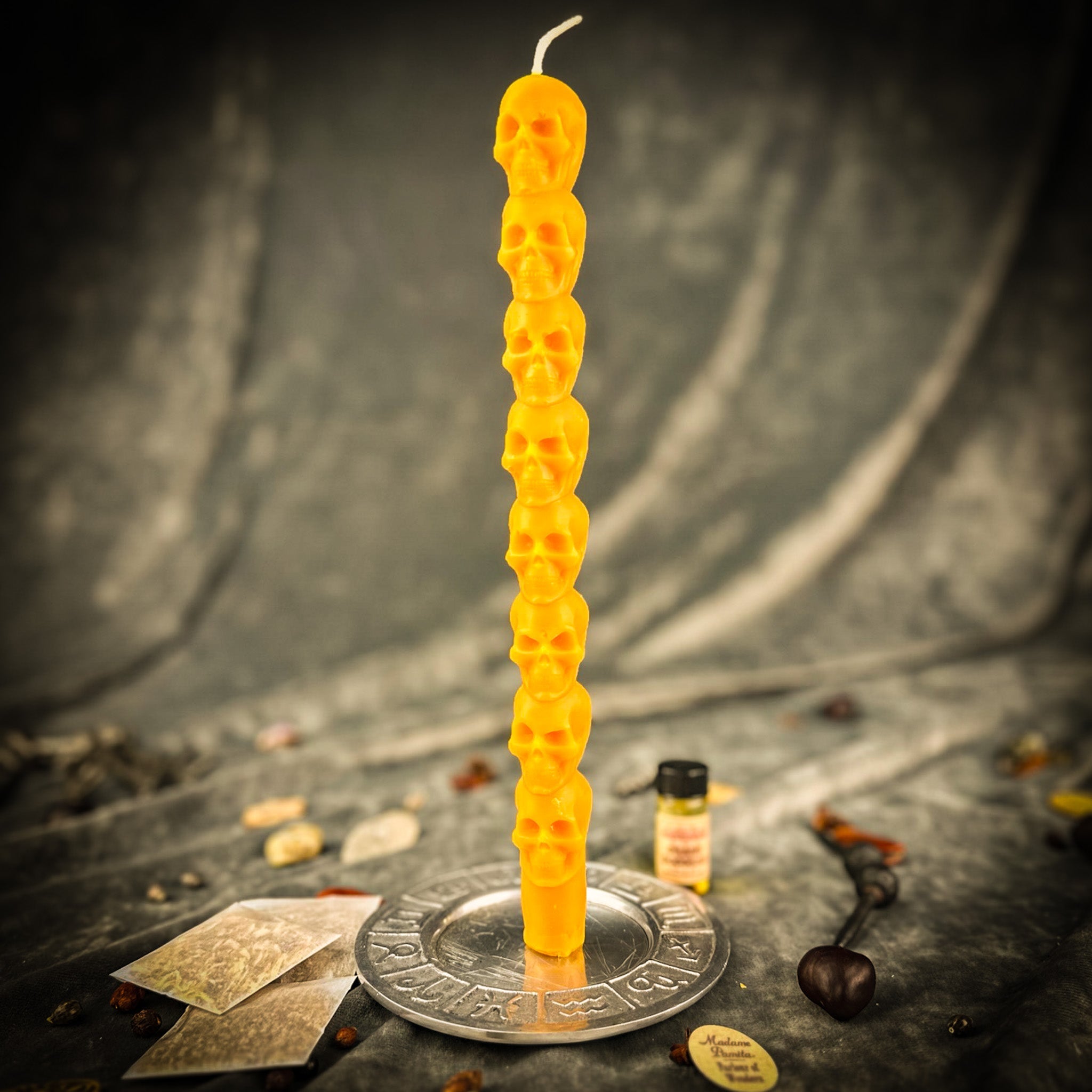 Orange Eight Day Skull Taper Candle Spell Kit by Parlour of Wonders for mind influence and ancestral wisdom.