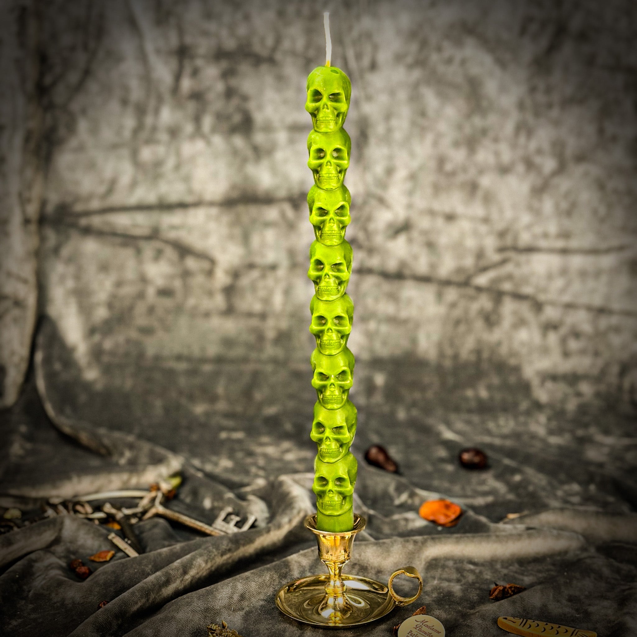Eight Day Skull Taper Candle Spell Kit by Parlour of Wonders featuring orange candles for mind influence and ancestral wisdom.