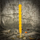 Orange Eight Day Skull Taper Candle Spell Kit by Parlour of Wonders for mind influence and ancestral wisdom.