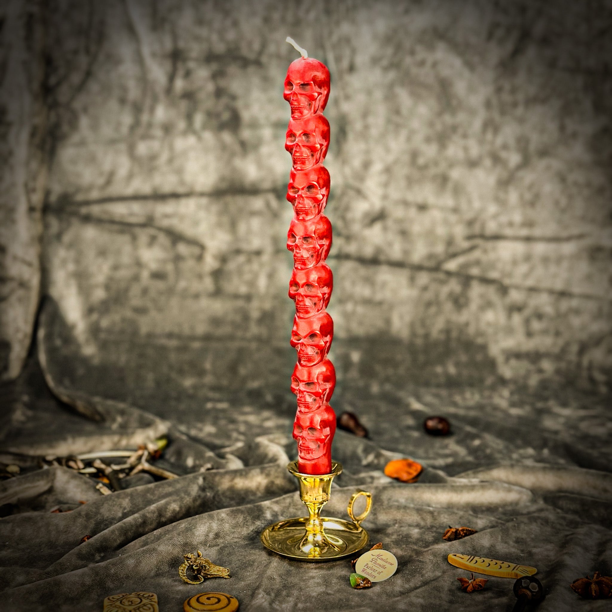 Eight Day Skull Taper Candle Spell Kit by Parlour of Wonders with orange candles for mind influence and ancestral wisdom.
