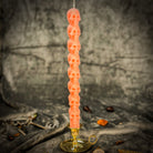 Orange Eight Day Skull Taper Candle Spell Kit by Parlour of Wonders, featuring candles and tools for mind influence and ancestral wisdom.