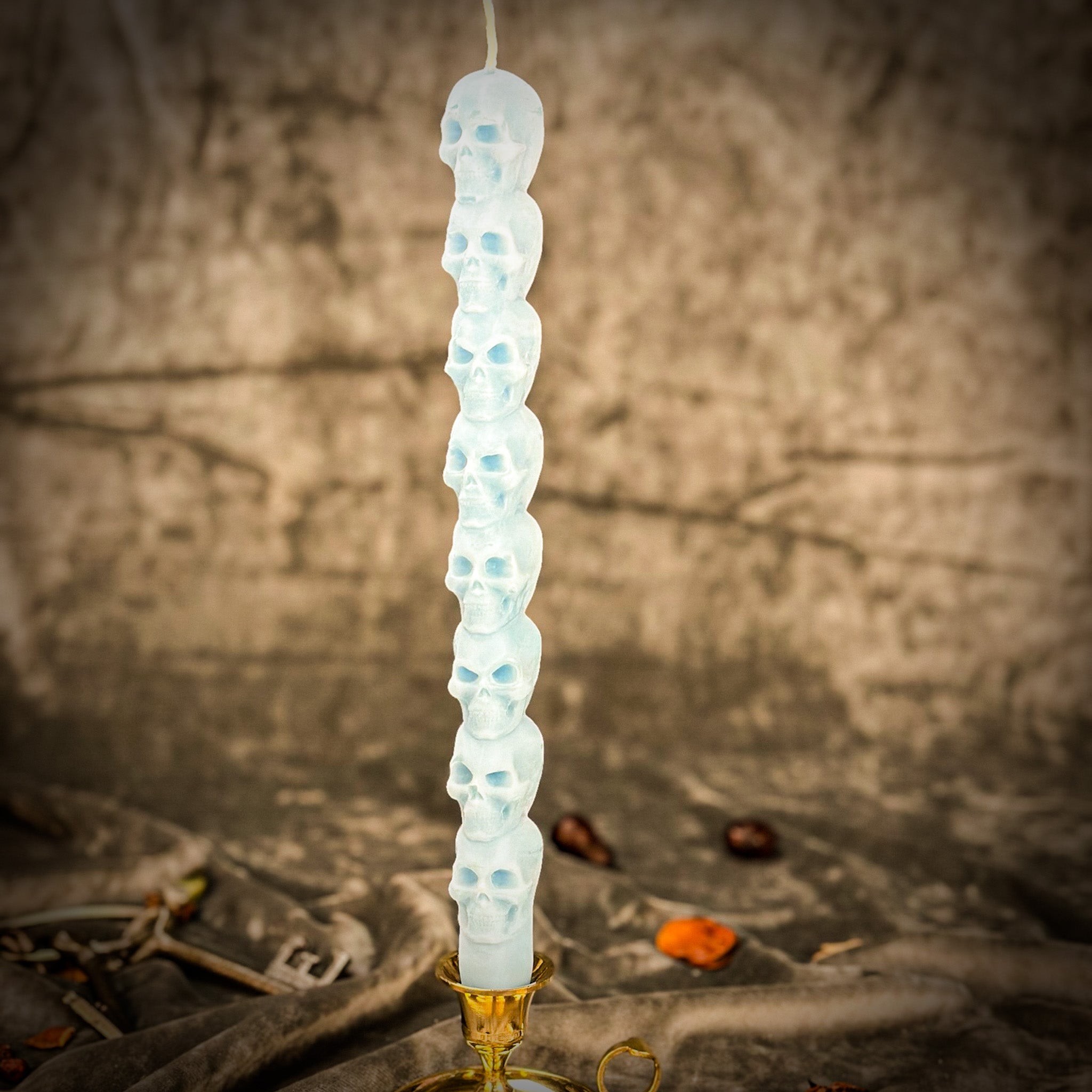 Orange Eight Day Skull Taper Candle Spell Kit by Parlour of Wonders, featuring candles and tools for mind influence and ancestral wisdom spells.