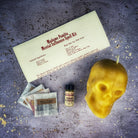 Orange Skull Candle Spell Kit by Parlour of Wonders for mental influence, mind control, and mental clarity in a candle spell kit.