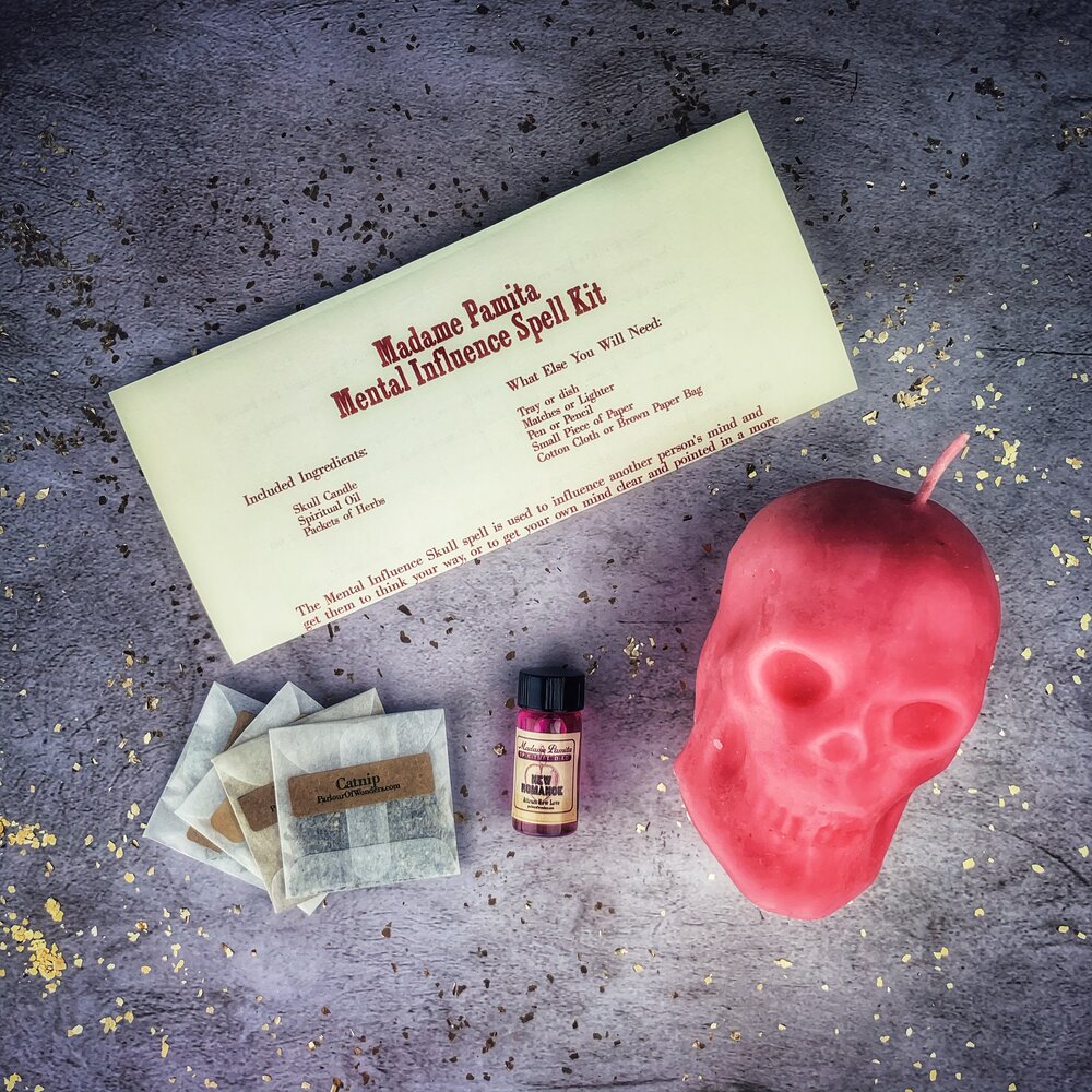 Parlour of Wonders Skull Candle Spell Kit with orange wax, designed for mind control and mental clarity in a ritual candle set.