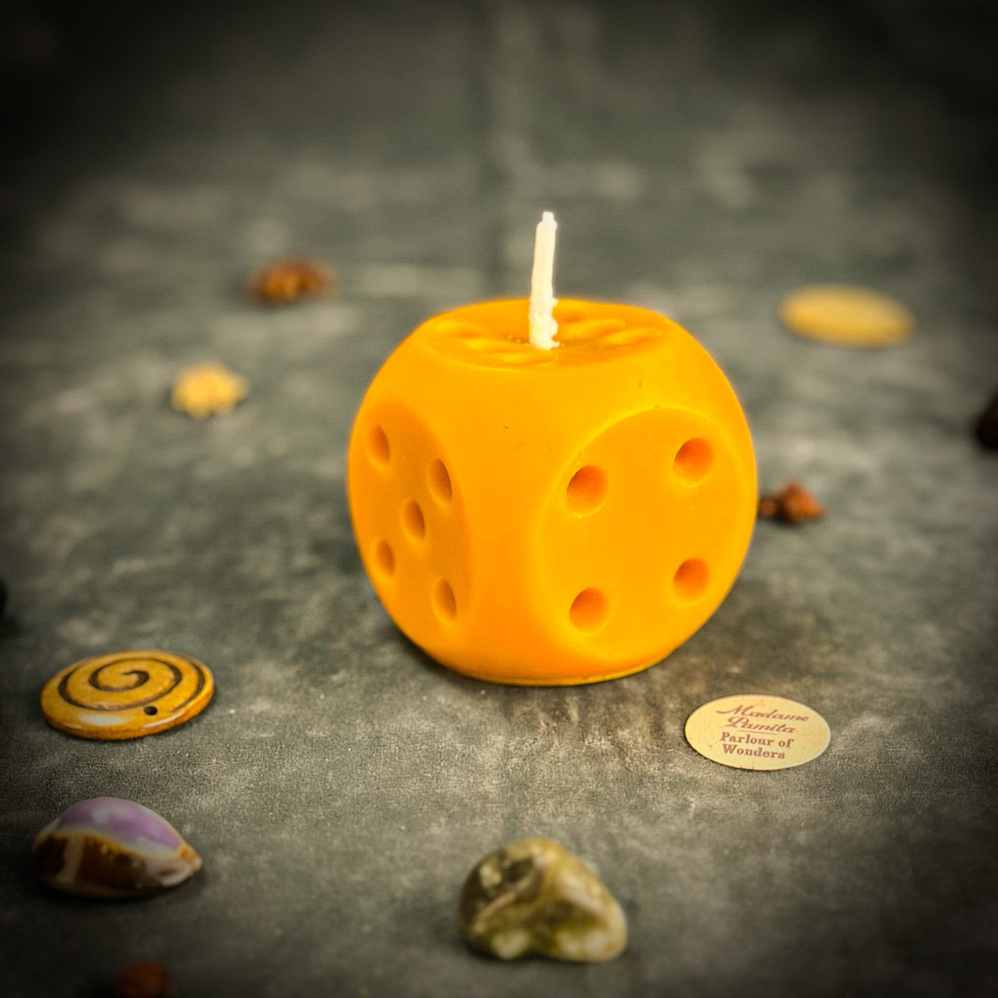 Lucky Dice Candle Spell Kit by Parlour of Wonders featuring orange candles and dice for gambling luck and good fortune.