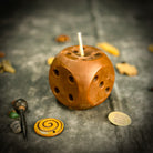 Lucky Dice Candle Spell Kit by Parlour of Wonders with orange candle and dice, promoting gambling luck and good fortune.