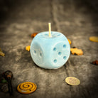 Parlour of Wonders Lucky Dice Candle Spell Kit with orange candle, dice, and spell components for gambling luck and good fortune.