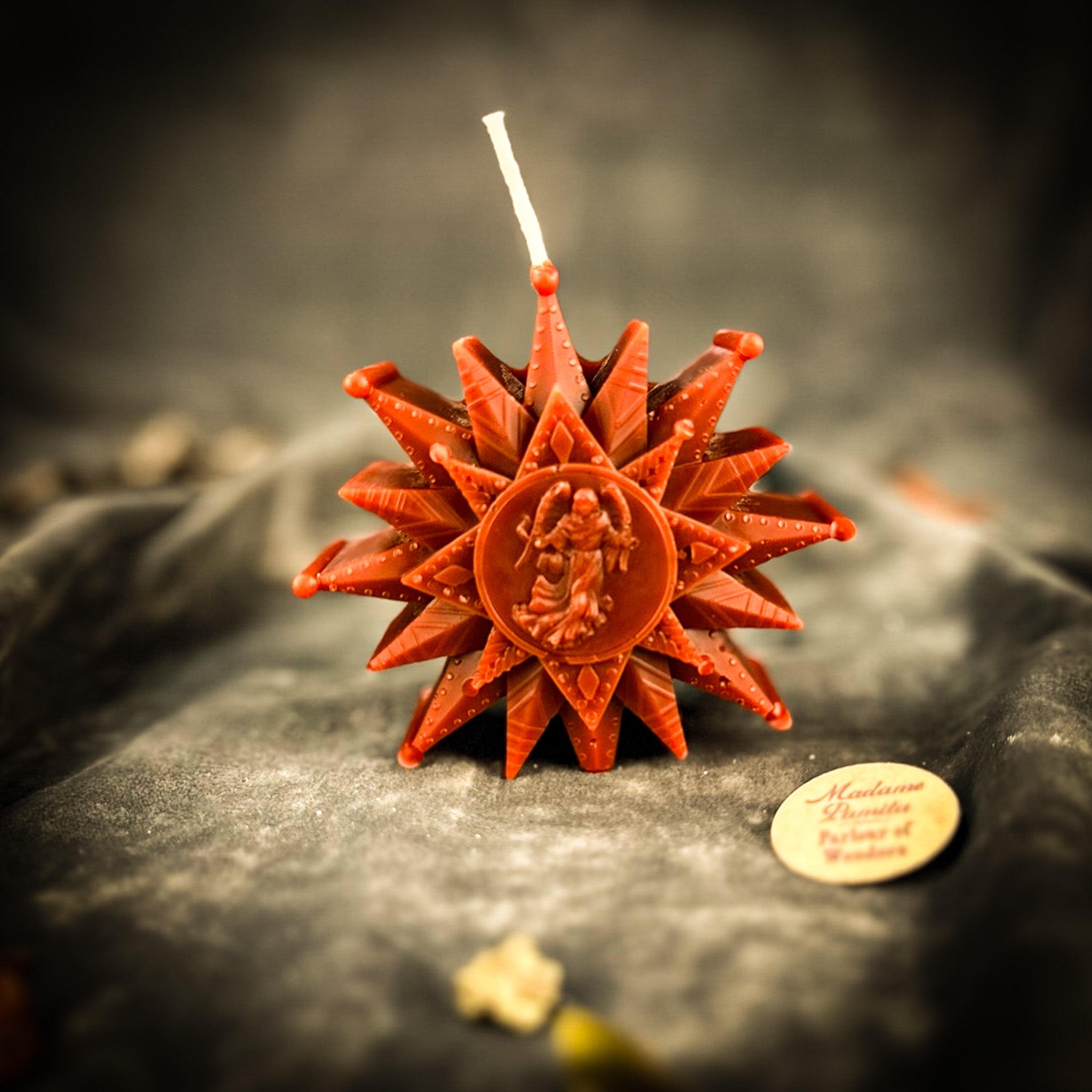 Parlour of Wonders Winter Wishing Star Candle Spell Kit with orange candles and spell materials for new beginnings.