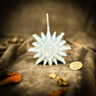 Parlour of Wonders Winter Wishing Star Candle Spell Kit with orange candles and spell components for new beginnings during winter.