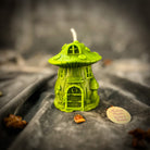 Cleansing Mushroom Fairy Hut Candle Spell Kit by Parlour of Wonders with orange fairy hut and candles for purification and renewal magic.