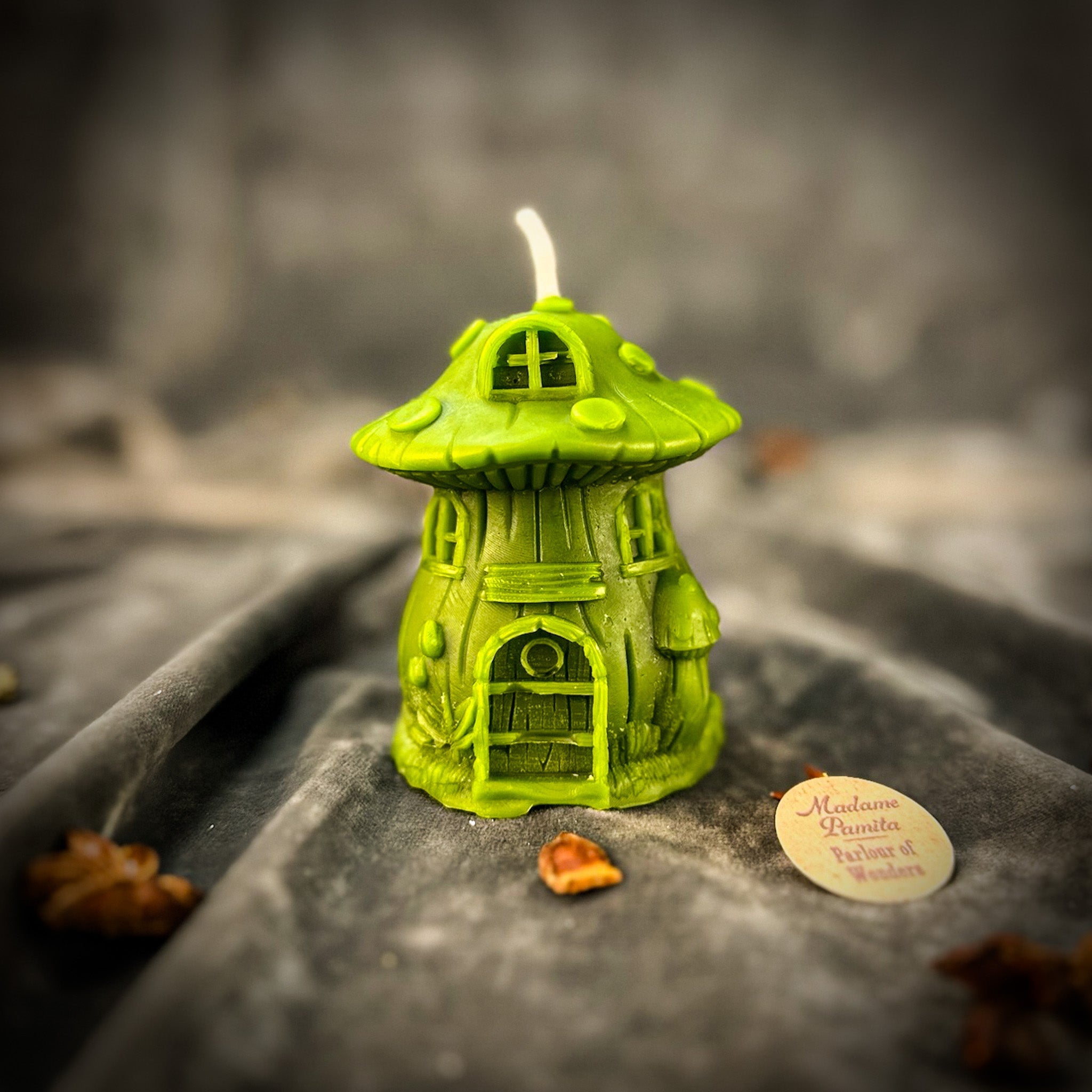 Cleansing Mushroom Fairy Hut Candle Spell Kit by Parlour of Wonders with orange fairy hut and candles for purification and renewal magic.