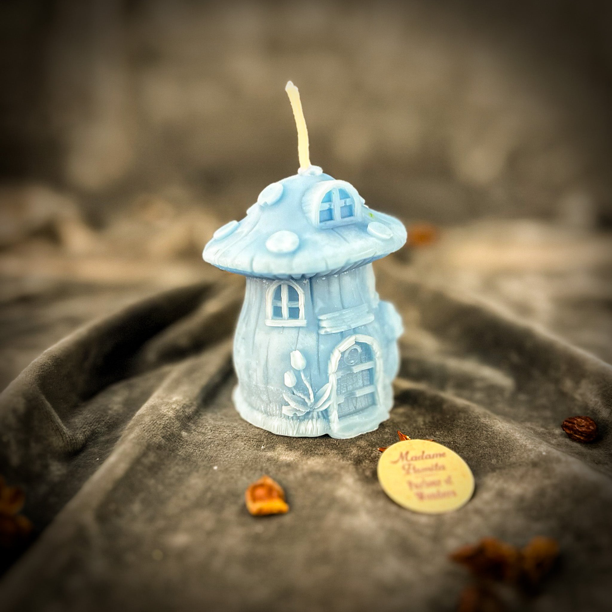 Parlour of Wonders cleansing mushroom fairy hut candle spell kit with orange candles for purification and renewal magic.