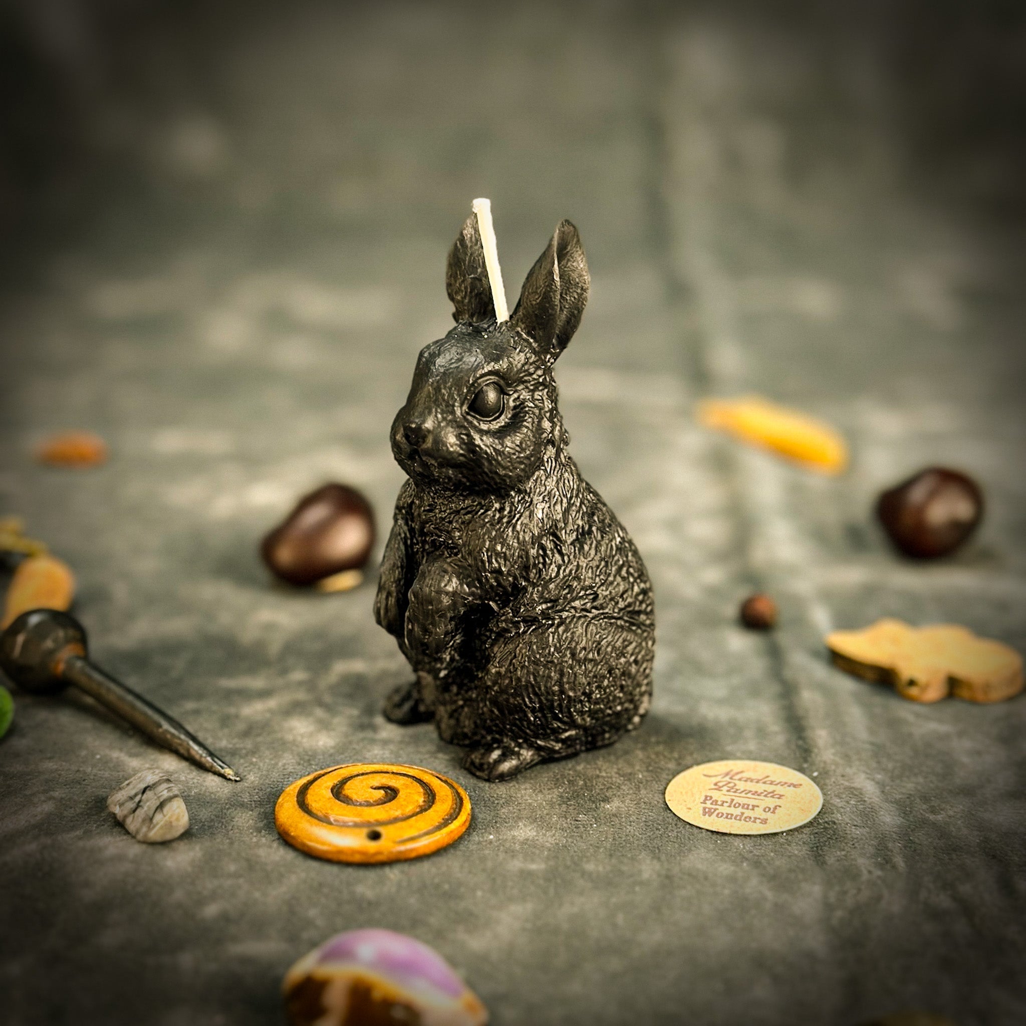 Parlour of Wonders Enchanted Bunny Candle Spell Kit for abundance and quick thinking, featuring orange candles and magical accessories.