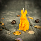 Parlour of Wonders Enchanted Bunny Candle Spell Kit for abundance and quick thinking magic, featuring orange candles and spell accessories.