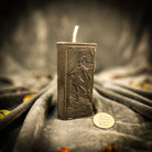 Parlour of Wonders Fool Candle Spell Kit with orange candles for new beginnings and adventure magic, featuring mystical symbols and herbs.