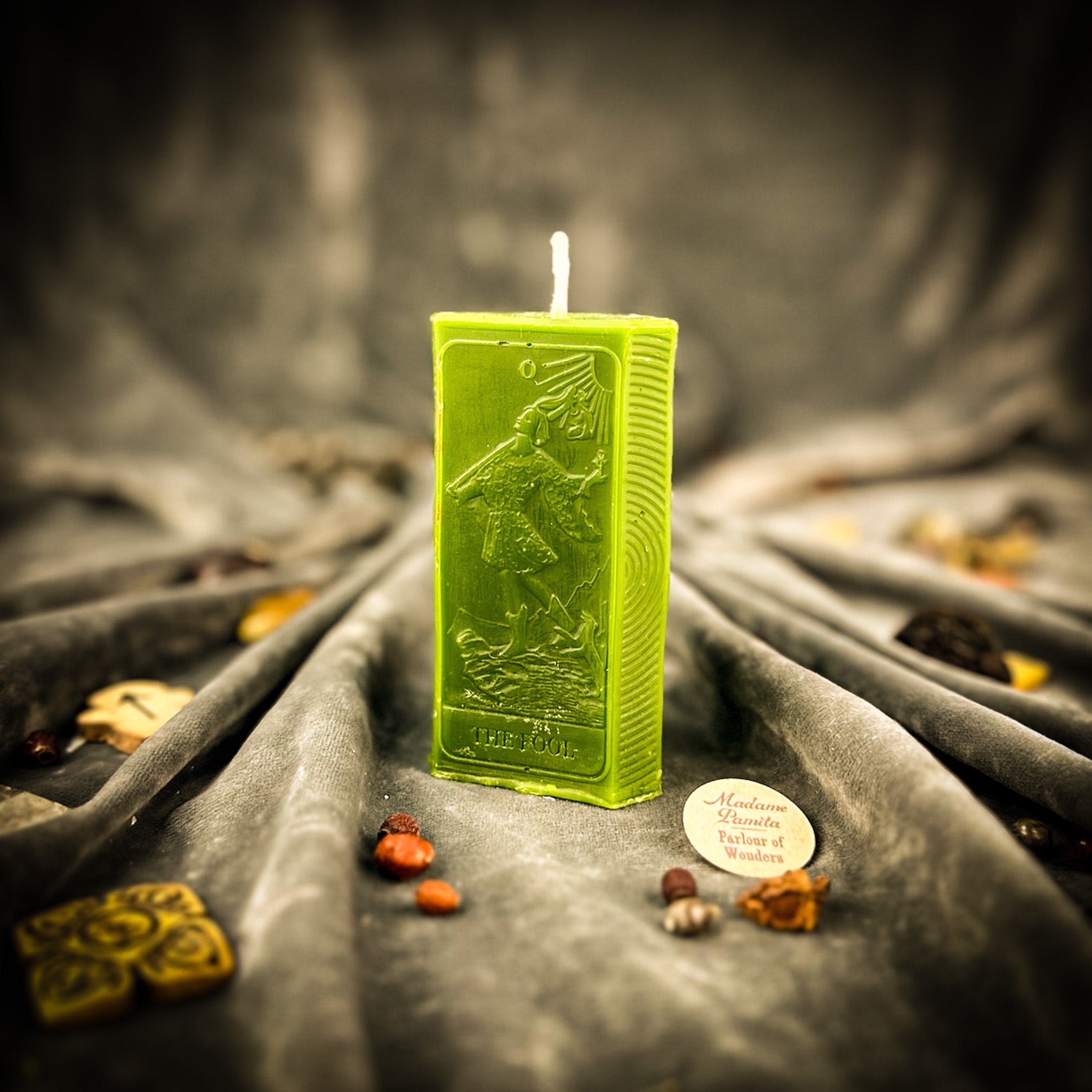 Parlour of Wonders Candle Spell Kit with orange candle for new beginnings and adventure magic, featuring mystical symbols and herbs.