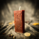 Orange Wheel of Fortune Candle Spell Kit by Parlour of Wonders, featuring candles and herbs for luck and opportunity magic.