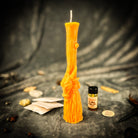 Sacred Goat Broom Candle Spell Kit by Parlour of Wonders featuring an orange candle for banishing and protection rituals.