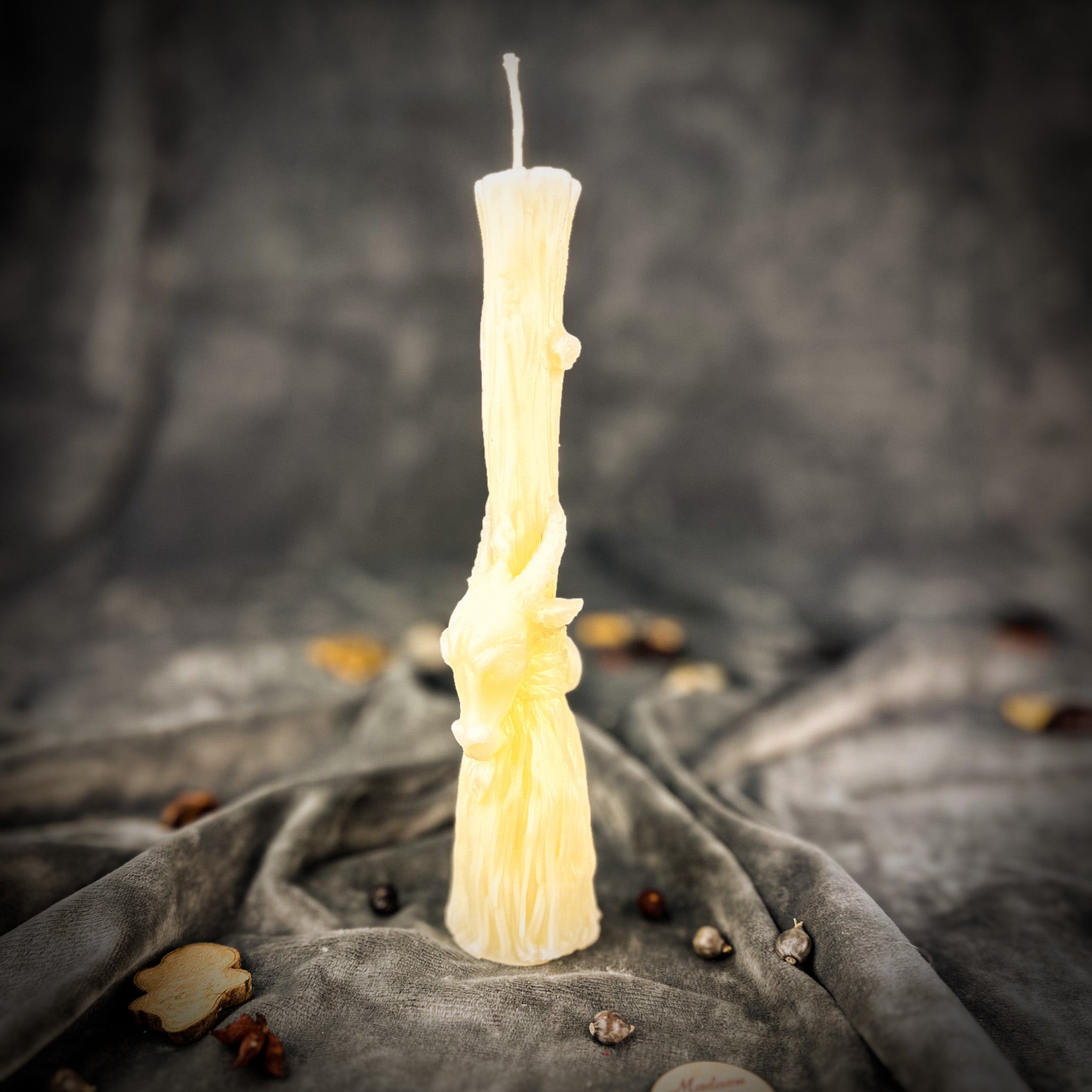 Sacred Goat Broom Candle Spell Kit by Parlour of Wonders with orange candles for banishing and protection spells.