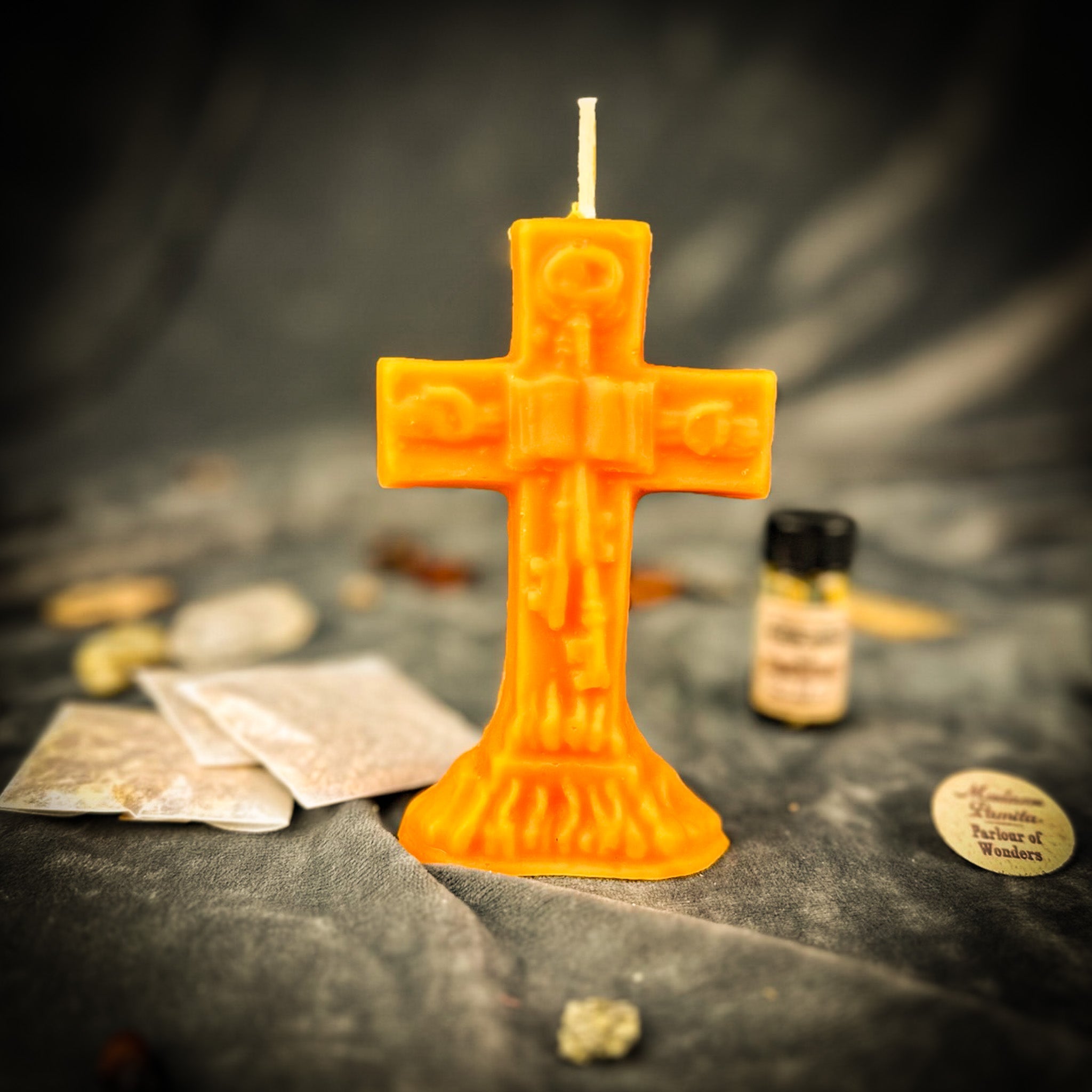 Orange Uncrossing Candle Spell Kit from Parlour of Wonders with candles, herbs, and tools for removing hexes, curses, and jinxes.