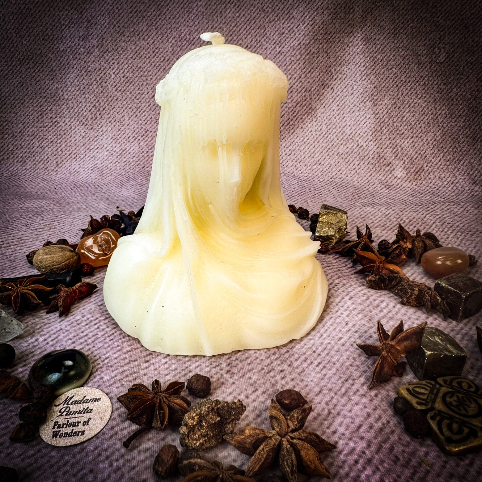 Parlour of Wonders Veil of Secrets Candle Spell Kit with orange candle and spell ingredients for truth and privacy magic.