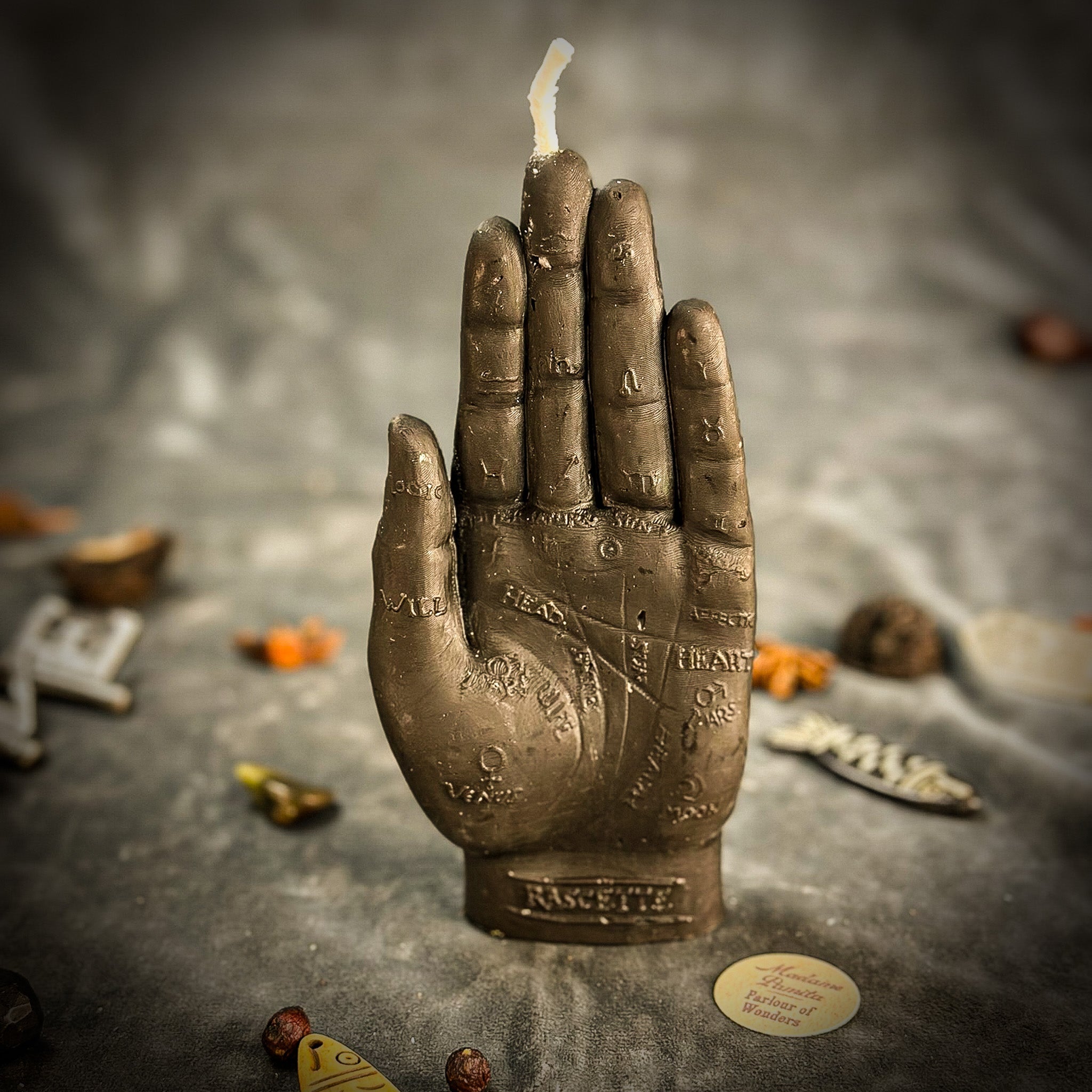 Pink Hand of Fate Candle Spell Kit from Parlour of Wonders featuring candles for destiny and transformation magic.