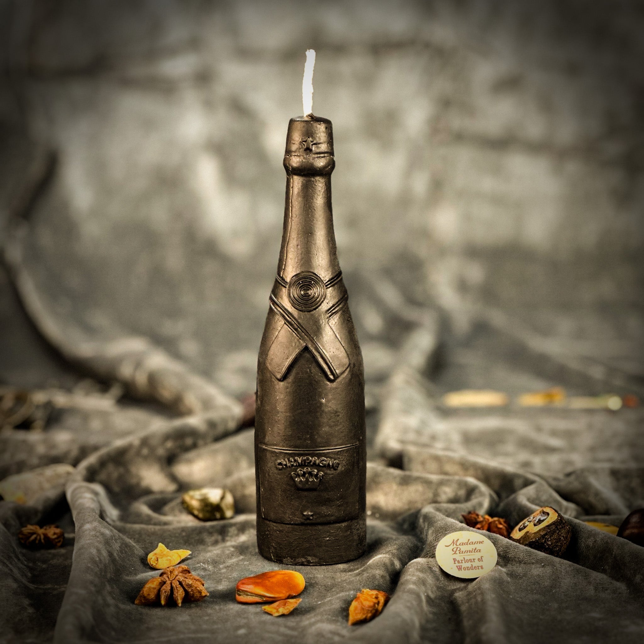 Pink champagne celebration candle spell kit by Parlour of Wonders for success and luxury manifestation with romantic candle elements.