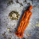 Male figural candle spell kit with pink candles from Parlour of Wonders, used for sympathetic magic and personal power rituals.