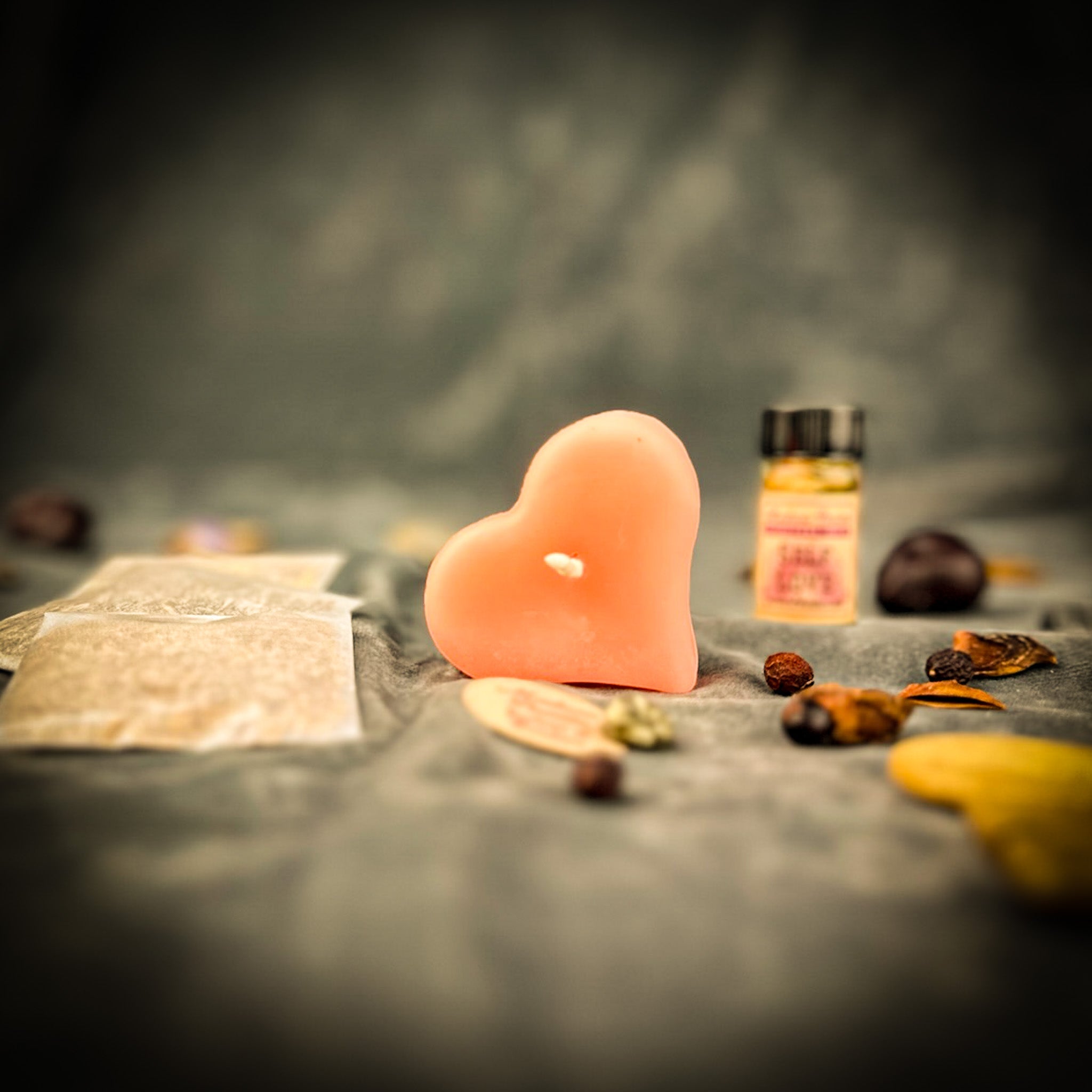 Mini Heart Candle Spell Kit by Parlour of Wonders with pink candles for love influence and emotional healing magic.
