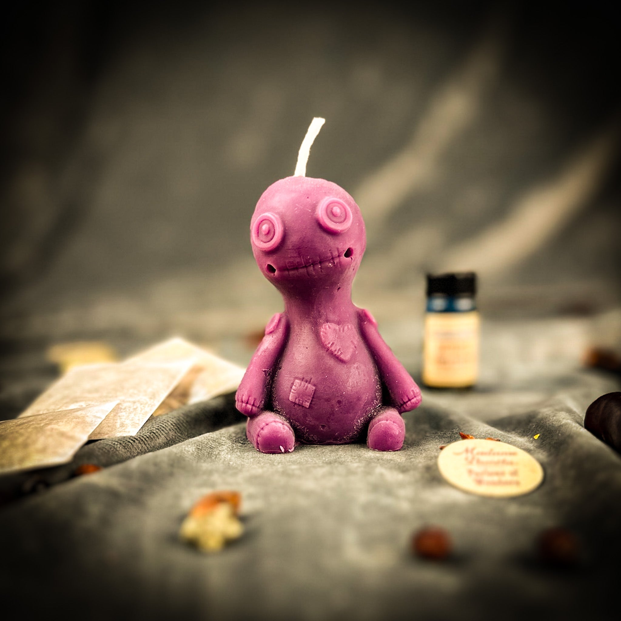 Purple Love Poppet Candle Spell Kit by Parlour of Wonders featuring candles and tools for sympathetic magic and influence spells.