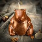 Parlour of Wonders Cuddly Capybara Cooperation Candle Spell Kit with purple candles for harmony and teamwork magic.